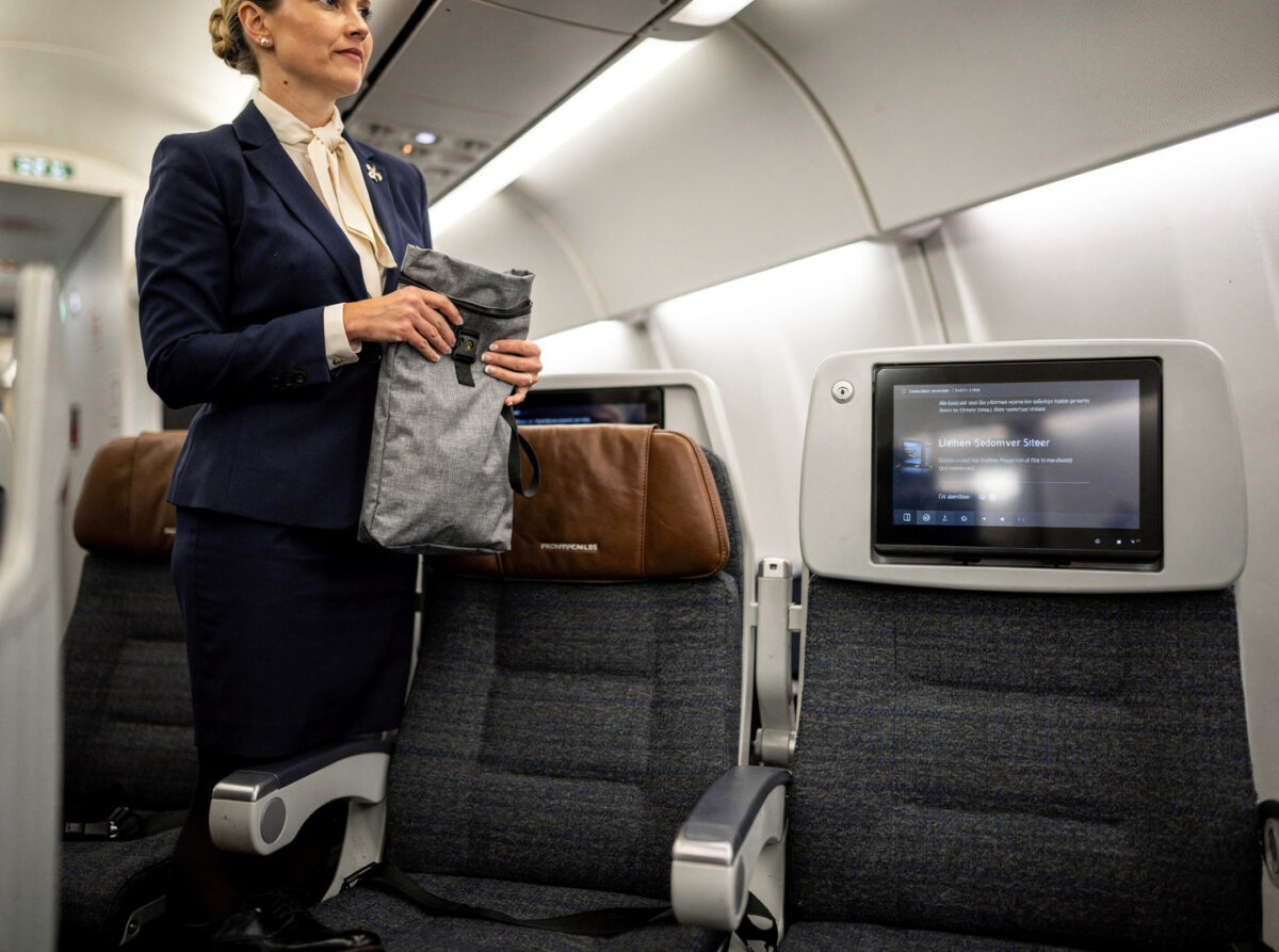 A passenger's power bank caught fire on a Lufthansa flight. Crew landed safely.